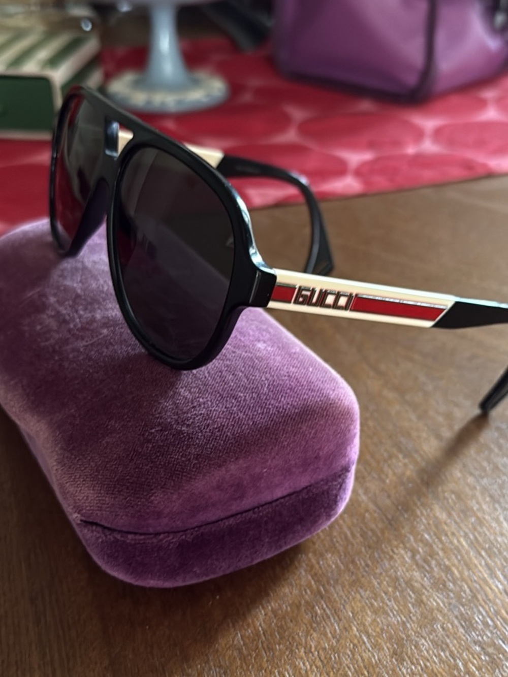 Gucci Black Sunglasses with Red and Ivory Temple Accents